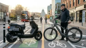 A commuter navigating a moped-style electric scooter through Montreal's extensive network of protected bike lanes.