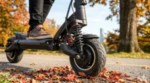 Close-up of the dual shock absorption system on a sturdy electric scooter for big guys, ideal for Canadian gravel trails.