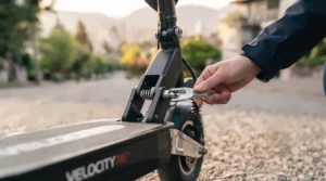 Compact folding mechanism of a lightweight long-range electric scooter ideal for multi-modal Canadian commuters.