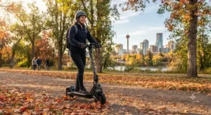 A rider wearing a safety helmet navigating an electric scooter for medium commutes past autumn leaves in Calgary.