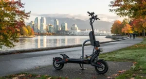 A long-range dual battery scooter for heavy riders parked near Vancouver waterfront trails during autumn.