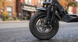 Heavy-duty suspension and all-terrain tires on a high-performance 40 km/h electric scooter.